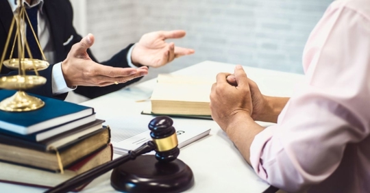 lawyer talking to a client