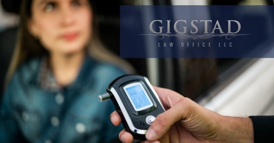 Close-up of traffic cop holding driving alcohol test